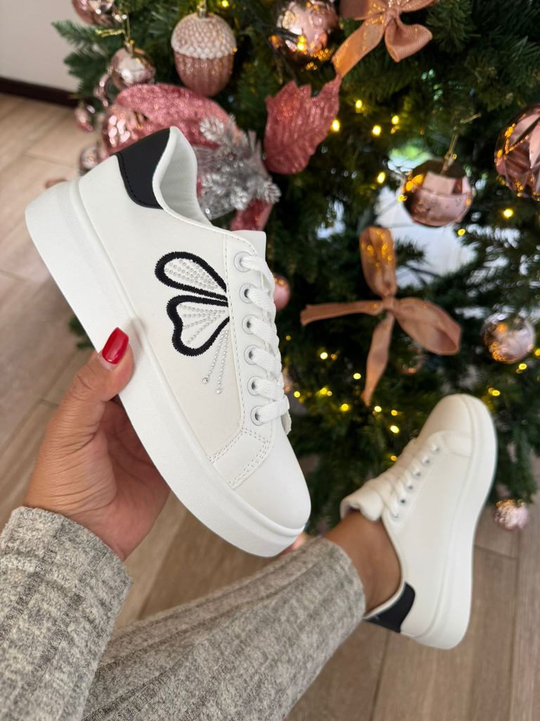 Tenis bajo Alas Mariposa