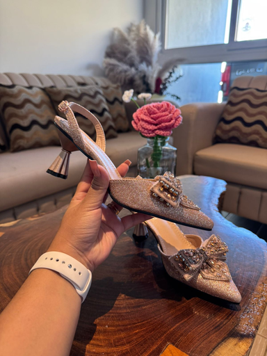 Tacon suela roja doble moña